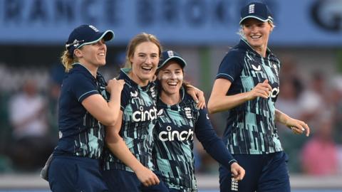 England players celebrate a wicket