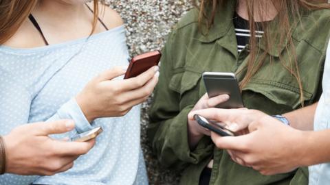 Teenagers on phones