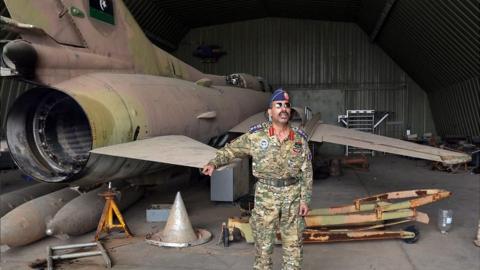 GNA officer Capt Qanunu posed next to a MiG-23 at captured al-Watiya airbase, 18 May 20