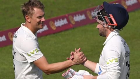 Durham captain Scott Borthwick congratulates Ollie Robinson following last week's win over Sussex