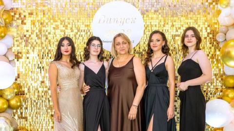 Sofiia, Yuliia, Aliesia along with their classmates travelled to Mykolaiv to celebrate together for their school prom in August 2023