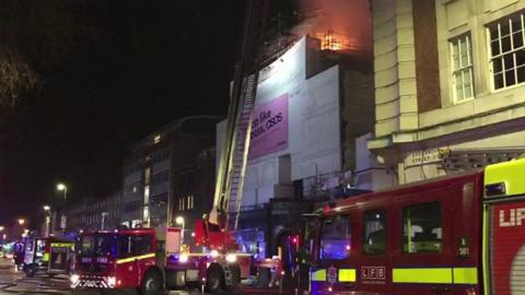 Fire engines fighting flames at Koko's in Camden