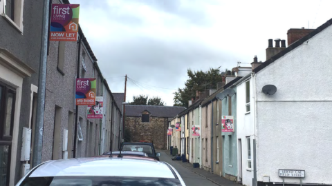 A street in Bangor, Gwynedd, with letting signs
