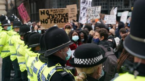 Police forming a barrier between BLM protesters and the counter demonstration in June 2020