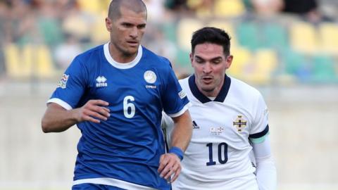 Cyprus Alex Gogic with Northern Ireland's Kyle Lafferty