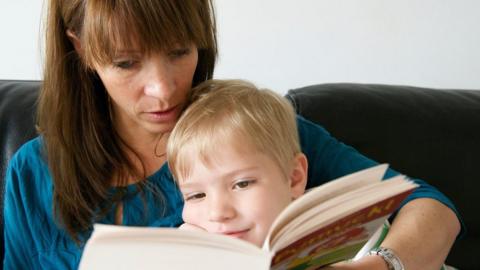 Mother reading to child