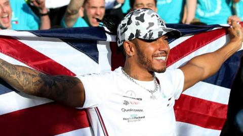 Lewis Hamilton celebrating his sixth Formula 1 drivers' title after the F1 Grand Prix of USA