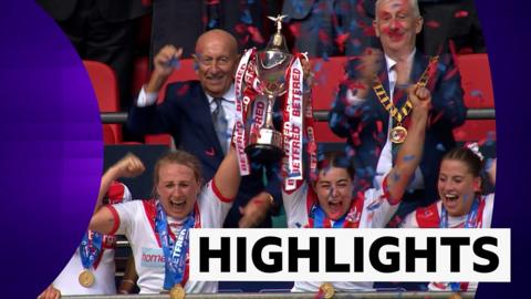St Helens lifts their trophy at the Women's Challenge Cup
