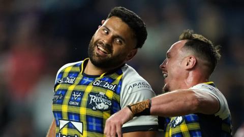 Rhyse Martin (left) scored 26 of Leeds Rhinos' 54 points against Huddersfield Giants