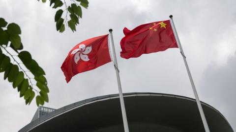 Hong Kong and Chinese flags