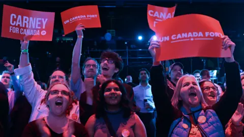 Image shows celebrating supporters