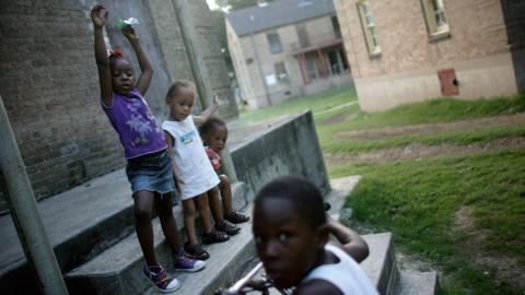 Housing project residents in New Orleans, Louisiana, in June 2007