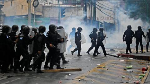 Riot police on the streets of Guatemala City
