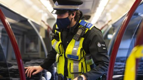 Police officer on train