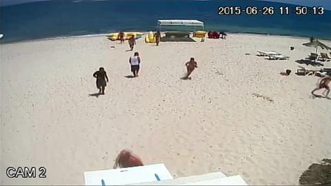 Still from CCTV shows scene on Tunisia beach