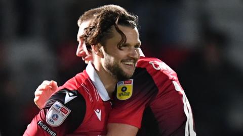 Stevenage's Jake Reeves celebrates his goal against Barrow