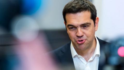 Greek Prime Minister Alexis Tsipras speaks during a media conference at an EU summit in Brussels on Monday, 22 June