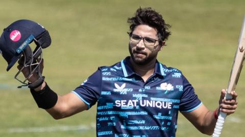 Imam-Ul-Haq of Yorkshire acknowledges the applause on reaching his century