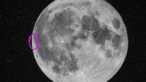 Image of the moon with a purple circle highlighting the potential crash site on the far left side as if viewing the moon from the northern hemisphere.