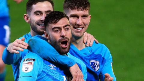 Bournemouth celebrate scoring their third goal