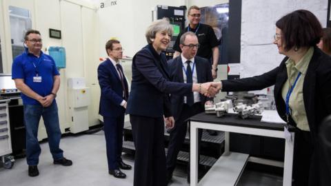 Theresa May tours the Octink sign manufacturers' factory