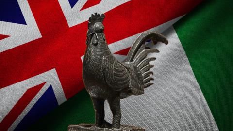 Nigerian and British flag, and Okukur statue