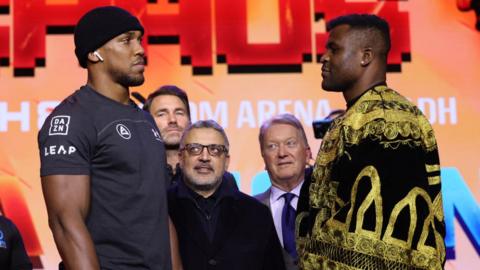 Anthony Joshua faces off with Francis Ngannou