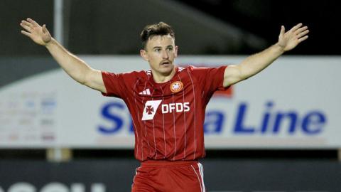 Eamon Fyfe celebrates