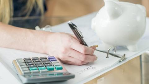 Child making a budget list