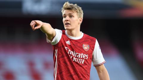 Martin Odegaard playing for Arsenal