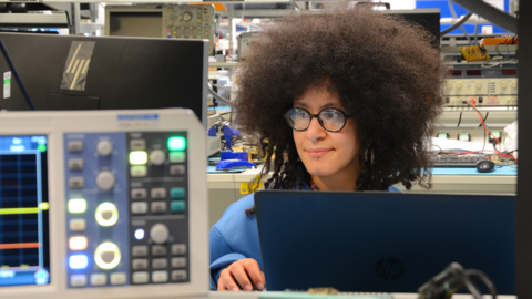 Image of Shrouk El-Attar working in a electronics laboratory