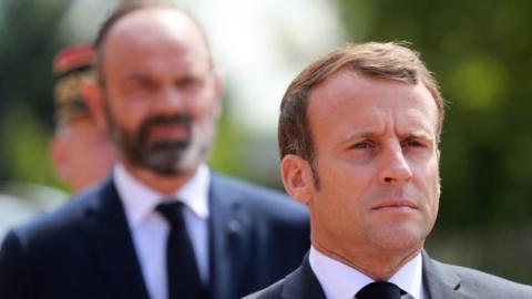 French President Emmanuel Macron (R) and French Prime Minister Edouard Philippe (L) file pic 18 June