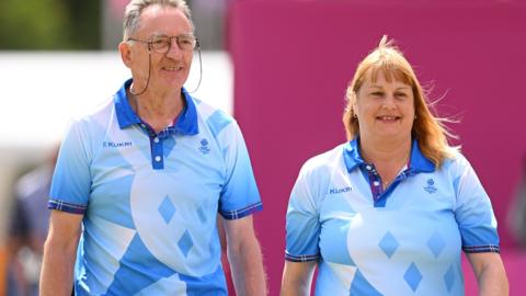 Scotland lawn bowler Melanie Inness with her director George Miller during the mixed pairs B2/B3 gold-medal final against Wales