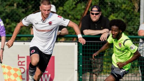 Pontypridd's Luke Cummings in action against Flint