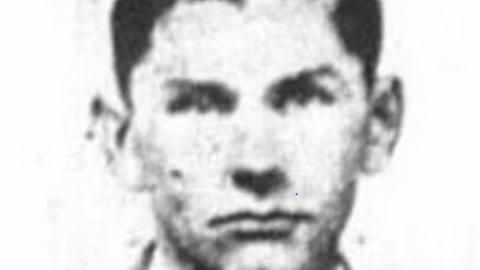 A black and white photo shows murder victim Jerzy Strzadala
