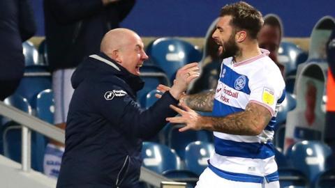 Charlie Austin of Queens Park Rangers (right) celebrates with boss Mark Warburton