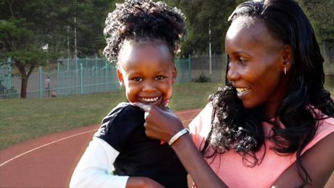 Daughter and mother on the athletics track