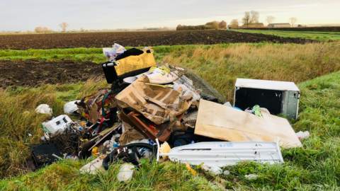 fly tipping in a field