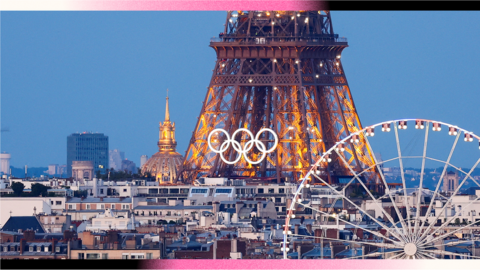 Cityscape of Paris featuring Eiffel Tower with Olympic rings on it