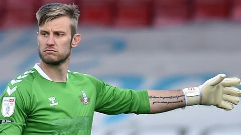 Laurie Walker kept two clean sheets while on an emergency loan at Oldham last season