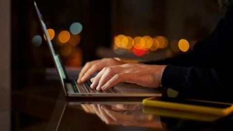 Person working on laptop