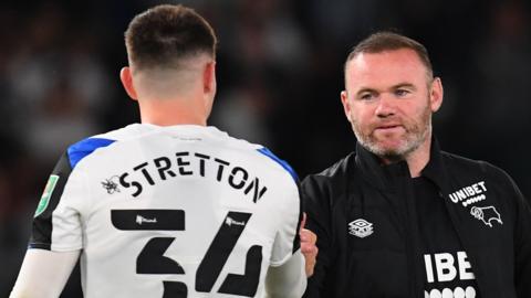 Wayne Rooney congratulates young striker Jack Stretton