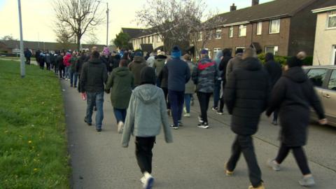 West Winds residents walking through estate