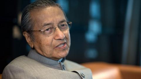 This file photo taken on June 14, 2012 shows former Malaysian prime minister Mahathir Mohamad speaking during an interview with AFP at his office in Kuala Lumpur