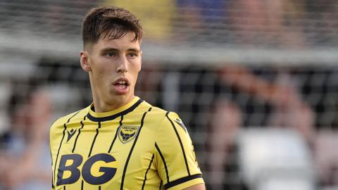 Oxford United defender Stephan Negru in action during a League One match.