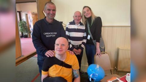 Craig Stanley, Graham Harris Of The Churn Project, Pete Stanley and Cllr Claire Bloomer at The Signpost Breakfast Cafe