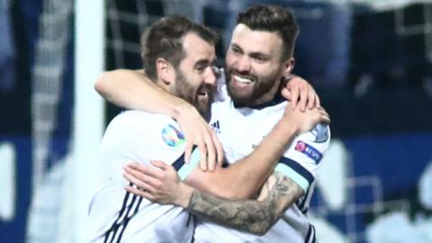 Niall McGinn celebrates with Stuart Dallas after levelling in Sarajevo before Northern Ireland went on to beat the Bosnians in a penalty shootout