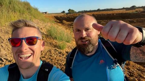 Matt Dyke, left, and Martin Church on a training walk