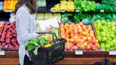 woman shopping for fruit and veg