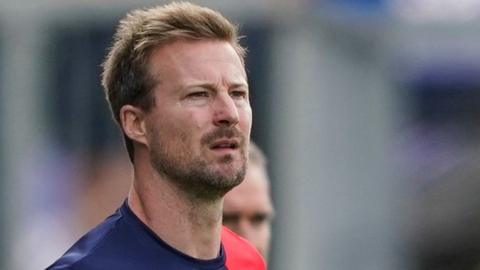 Cheltenham head coach Wade Elliott looks on from the touchline